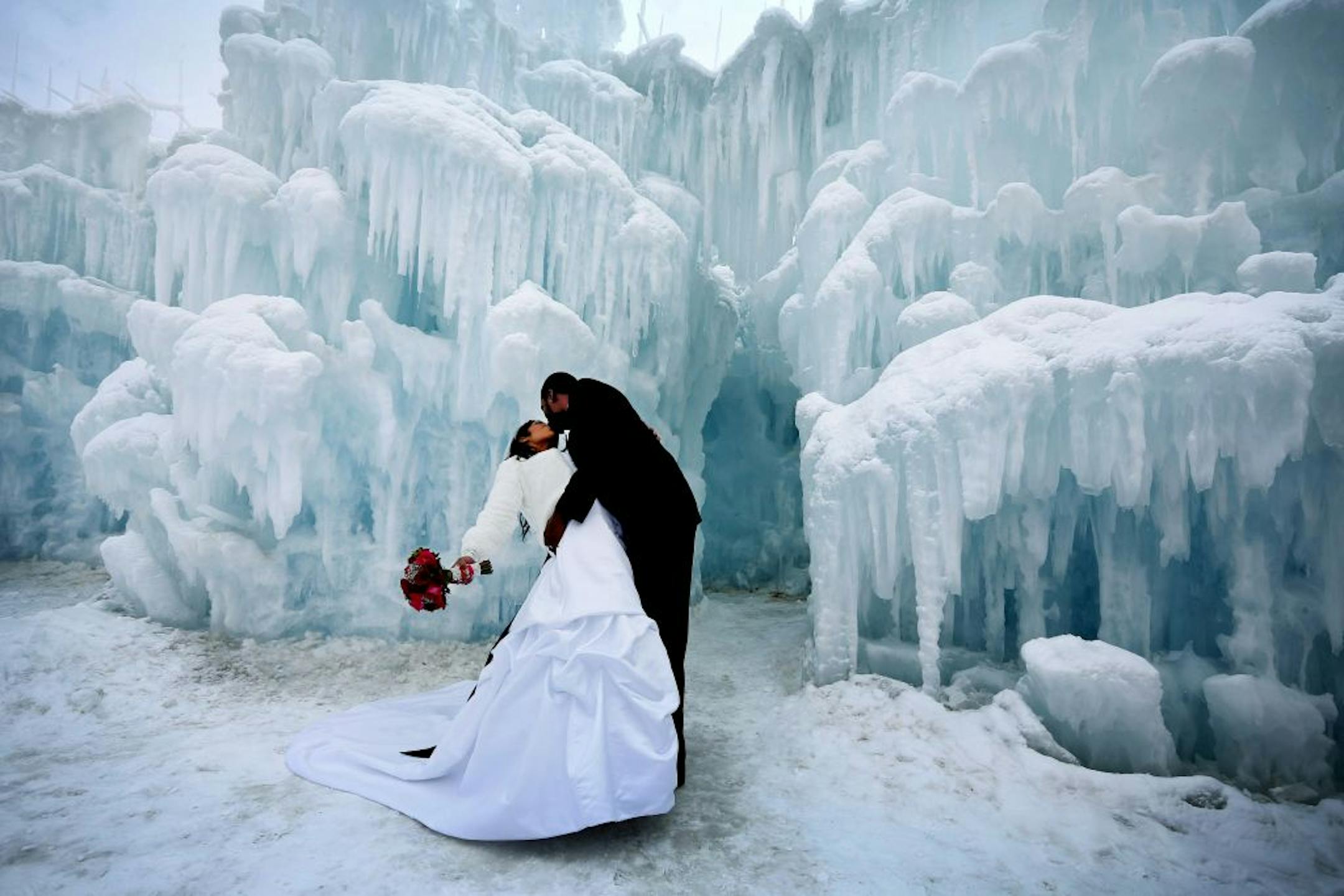 Brandon and Natasha Green of Minneapolis christened their marriage after being one of 11 couples who were wed Thursday morning at the Mall of America Ice Castle. The couples wrote the winning essays on why they wanted to be married then and there.