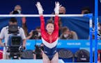 Suni Lee of the United States competes on the uneven bars during the women's team gymnastic's final at the delayed Tokyo 2020 Olympic Games in Tokyo o