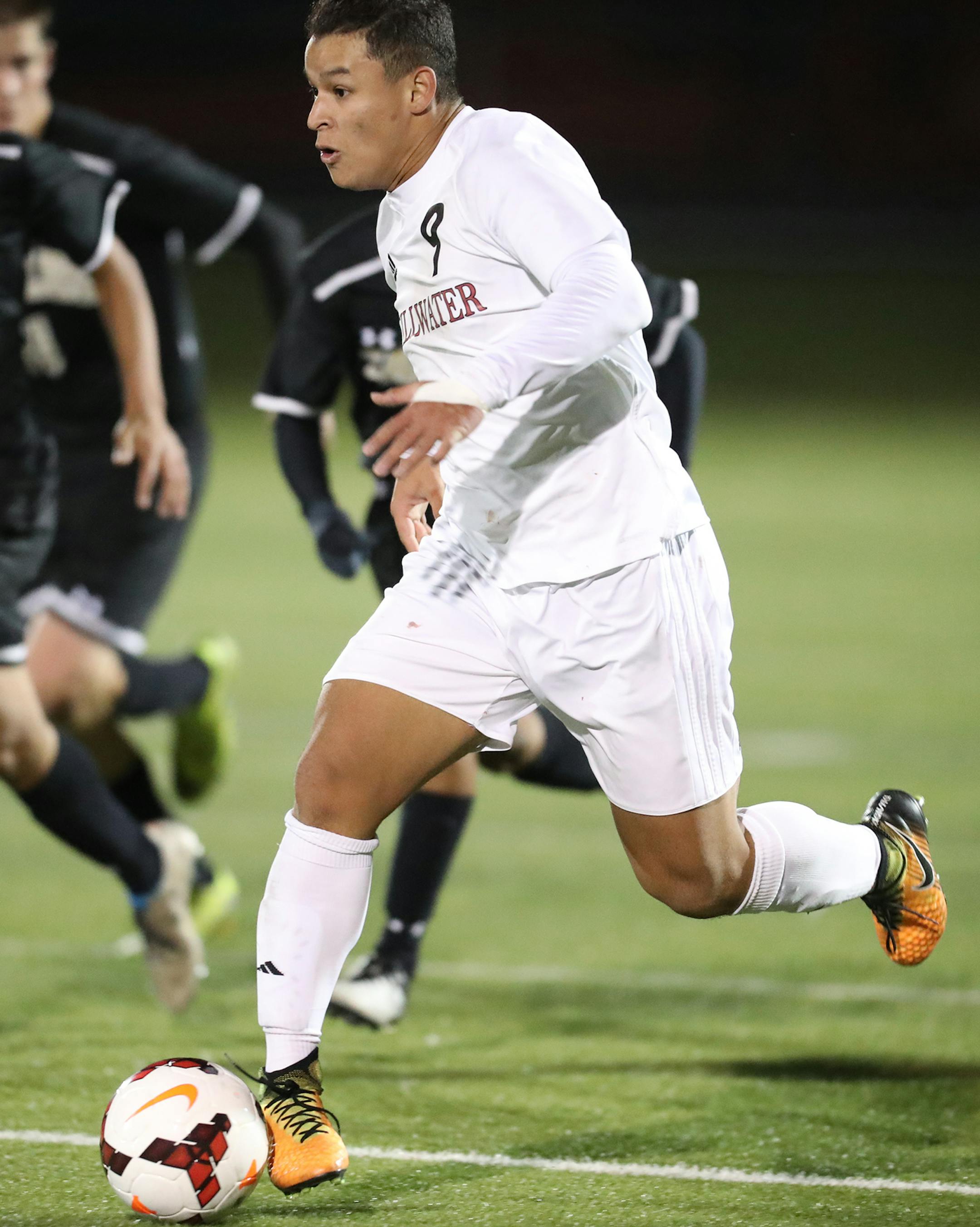 Stillwater's Jorge Malon (9) runs with the ball during the second half. ] LEILA NAVIDI ï leila.navidi@startribune.com BACKGROUND INFORMATION: Apple Valley High School plays Stillwater High School in the class 2A boys state soccer finals at Chisago Lakes High School in Lindstrom on Wednesday, October 25, 2017. Stillwater won the game 2-0.