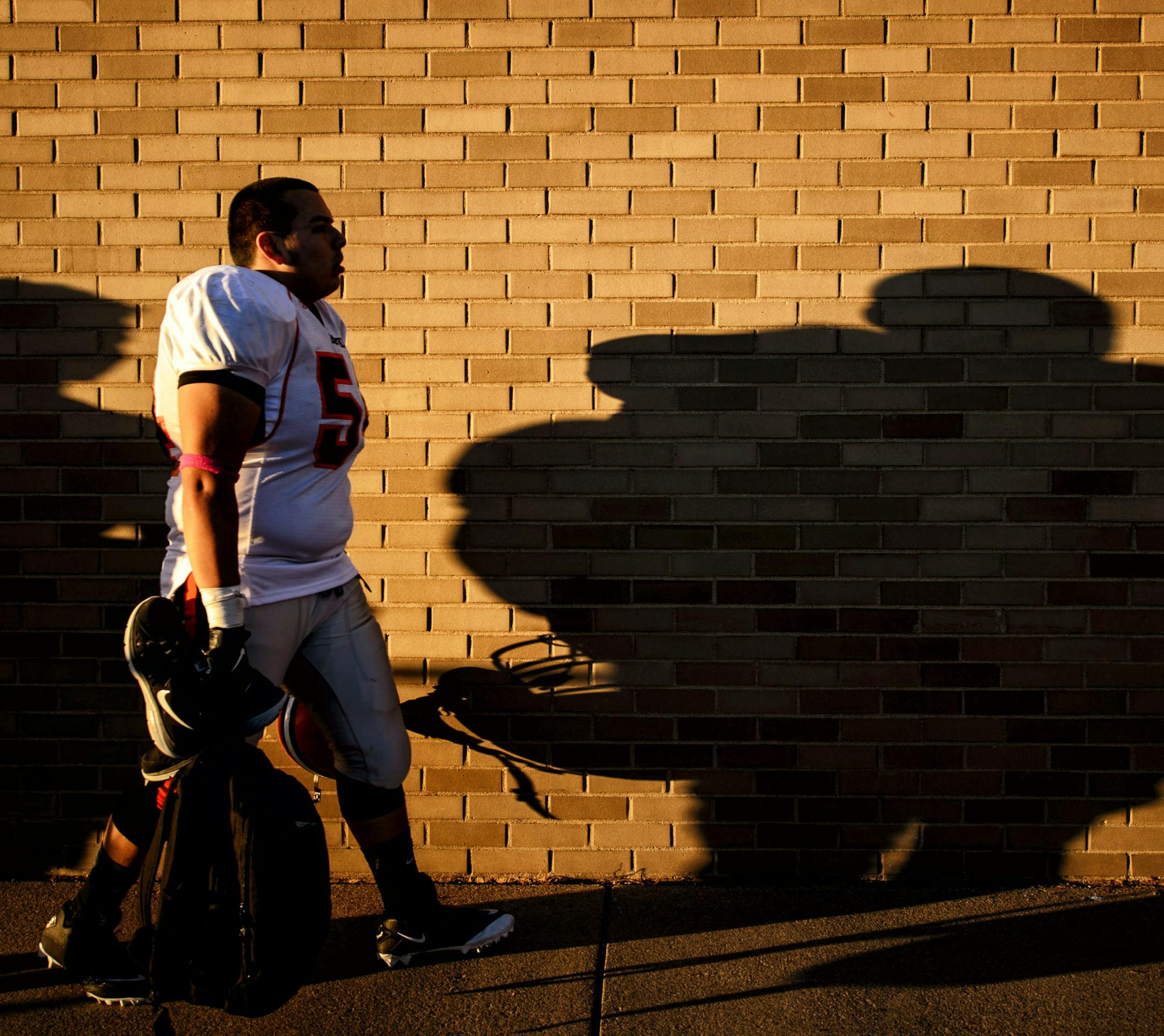 Humbolt players walked toward the bus on their way home. Likely to play teams more equally matched now. Humbolt lost the game 42-6. ] GLEN STUBBE * gstubbe@startribune.com Wednesday October 15, 2014 St. Paul Humboldt plays its last football game ever as a member of the St. Paul City Conference Wednesday afternoon. All conferences are going away in football, as schools switch to districts for easier scheduling and more competitive balance. Perhaps no school will be happier to see the end come tha