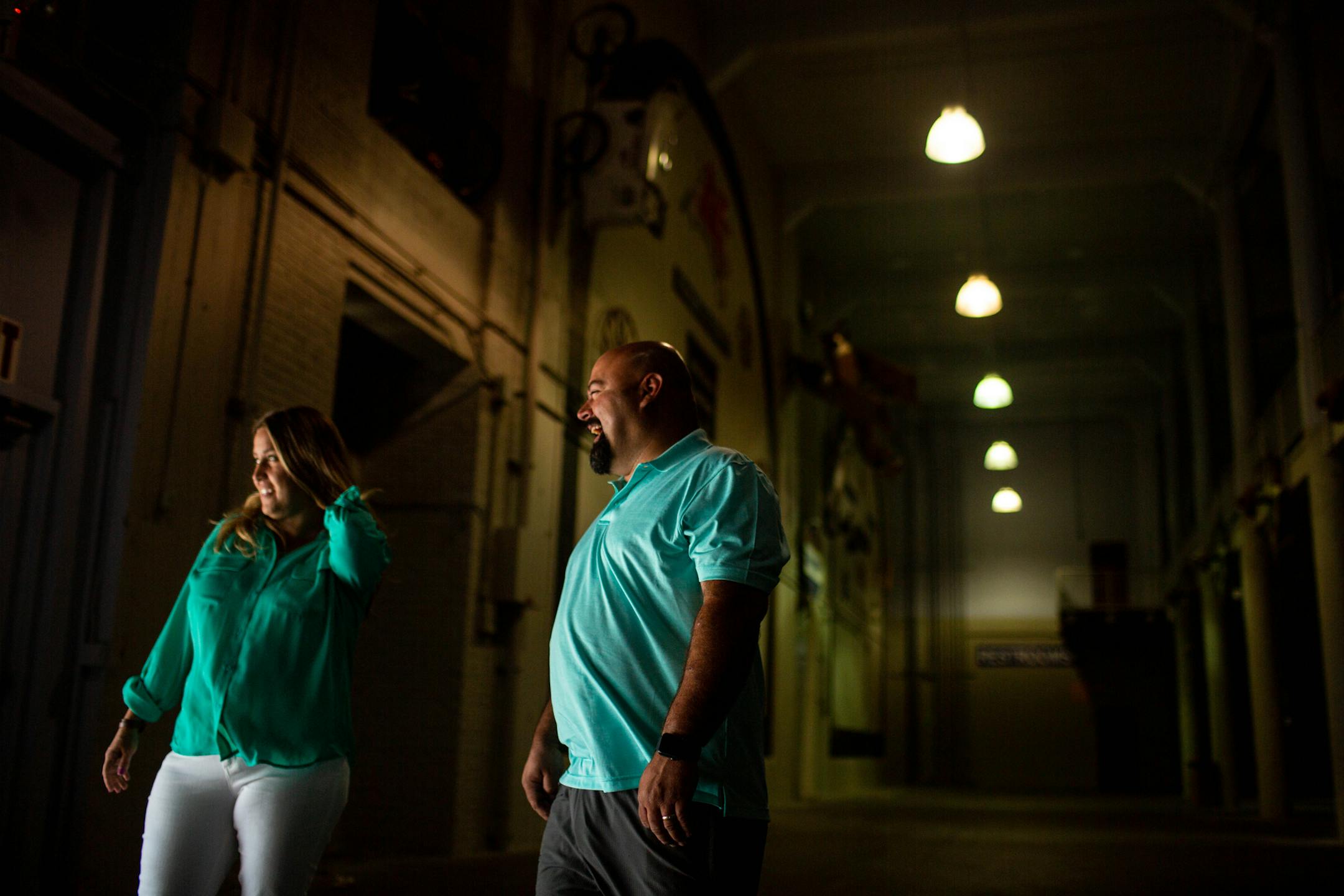 Brian Enloe and his wife Jennie Enloe laughed as they watch their sons play in the Hideaway Speakeasy.