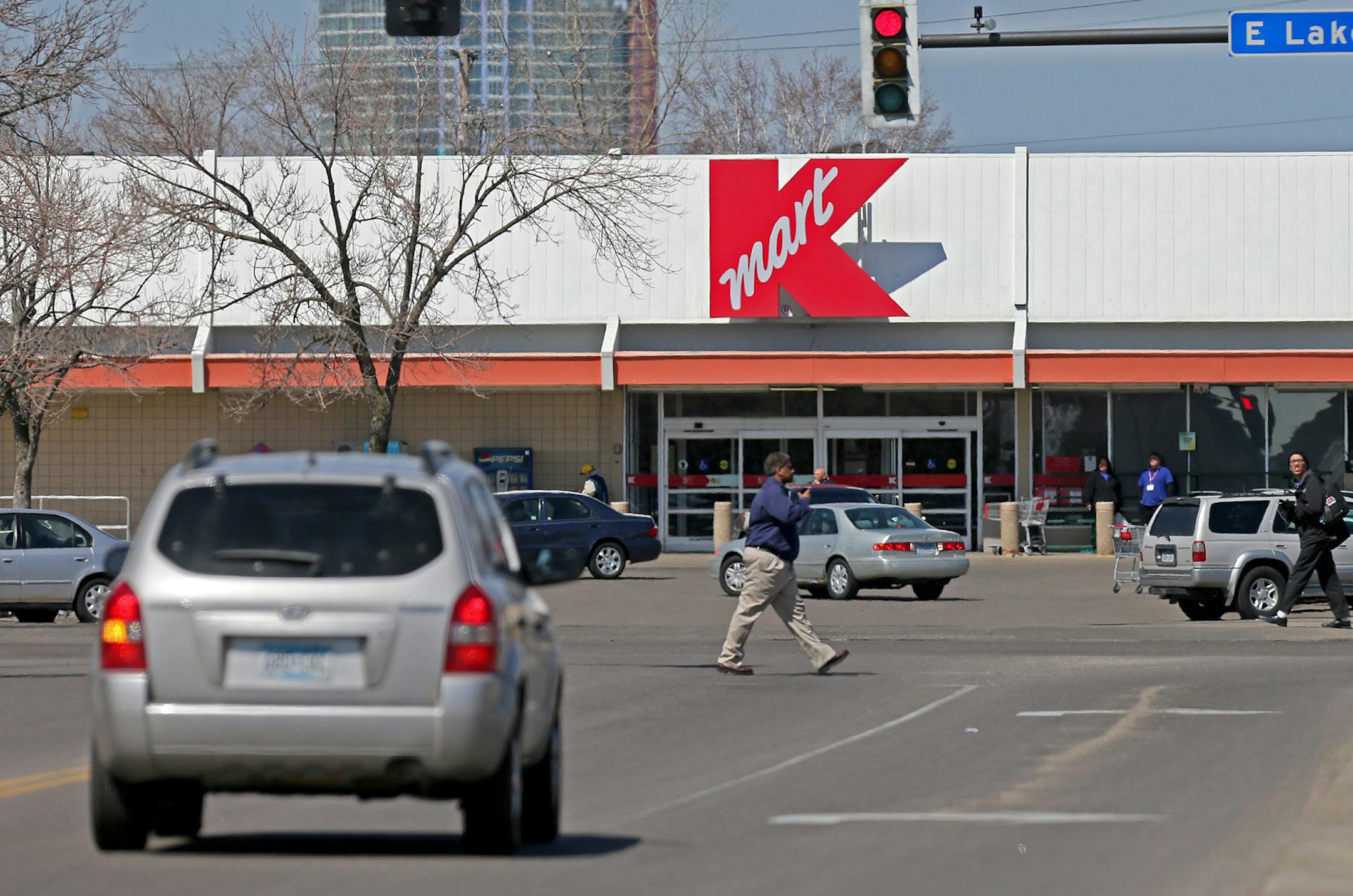 Pedestirans made their way to and near the Kmart near the corner of Nicollet and Lake Streets, Tuesday, April 15, 2014 in Minneapolis, MN. Minneapolis officials discussed Tuesday a redevelopment plan that would reverse one of the biggest planning blunders in city history: closing Nicollet Avenue at Lake Street. ] (ELIZABETH FLORES/STAR TRIBUNE) ELIZABETH FLORES ¬• eflores@startribune.com ORG XMIT: MIN1404151430151262
