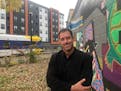 CEO Joe Hobot at the American Indian OIC at Franklin and Cedar avenues, adjacent to an Indian-developed affordable housing project that also is part o
