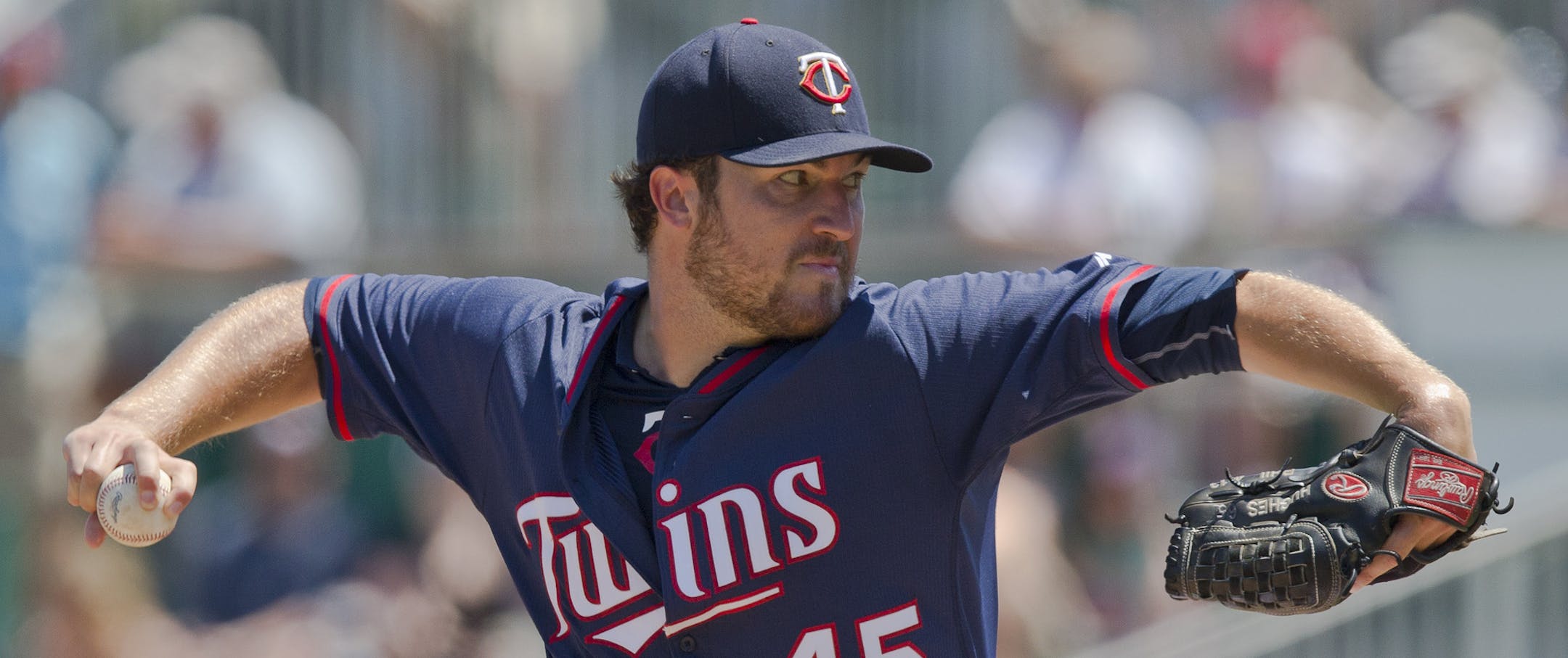 Minnesota Twins starting pitcher Phil Hughes delivers against the Boston Red Sox in the first inning during an exhibition spring training baseball game, Wednesday, April 1, 2015, in Fort Myers, Fla. (AP Photo/Brynn Anderson)