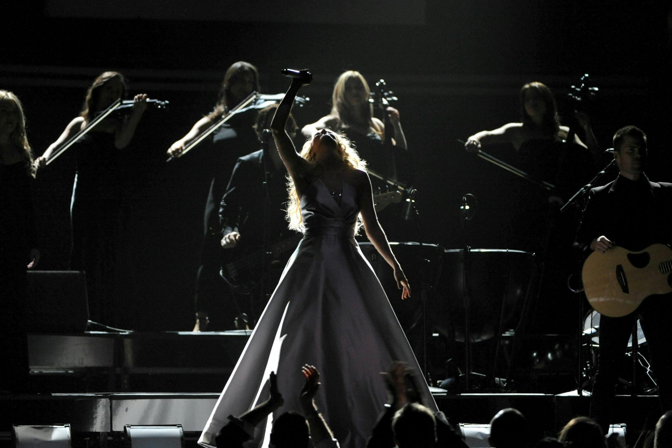 Carrie Underwood performs on stage at the 55th annual Grammy Awards on Sunday, Feb. 10, 2013, in Los Angeles.