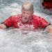 Former NFL player Dave Casper did the Polar Plunge at Super Bowl Live on Nicollet Mall in Minneapolis.