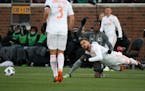 Atlanta United defender Leandro Gonzalez (5) went down as he collided with Minnesota United forward Abu Danladi (9) in the first half.