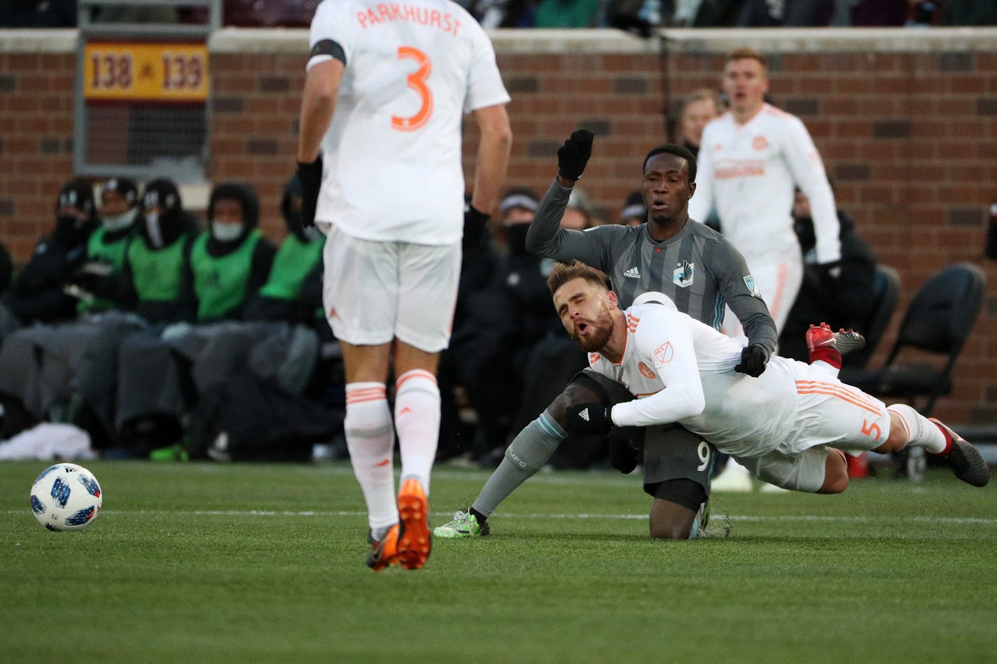 Atlanta United defender Leandro Gonzalez (5) went down as he collided with Minnesota United forward Abu Danladi (9) in the first half.