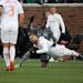 Atlanta United defender Leandro Gonzalez (5) went down as he collided with Minnesota United forward Abu Danladi (9) in the first half.