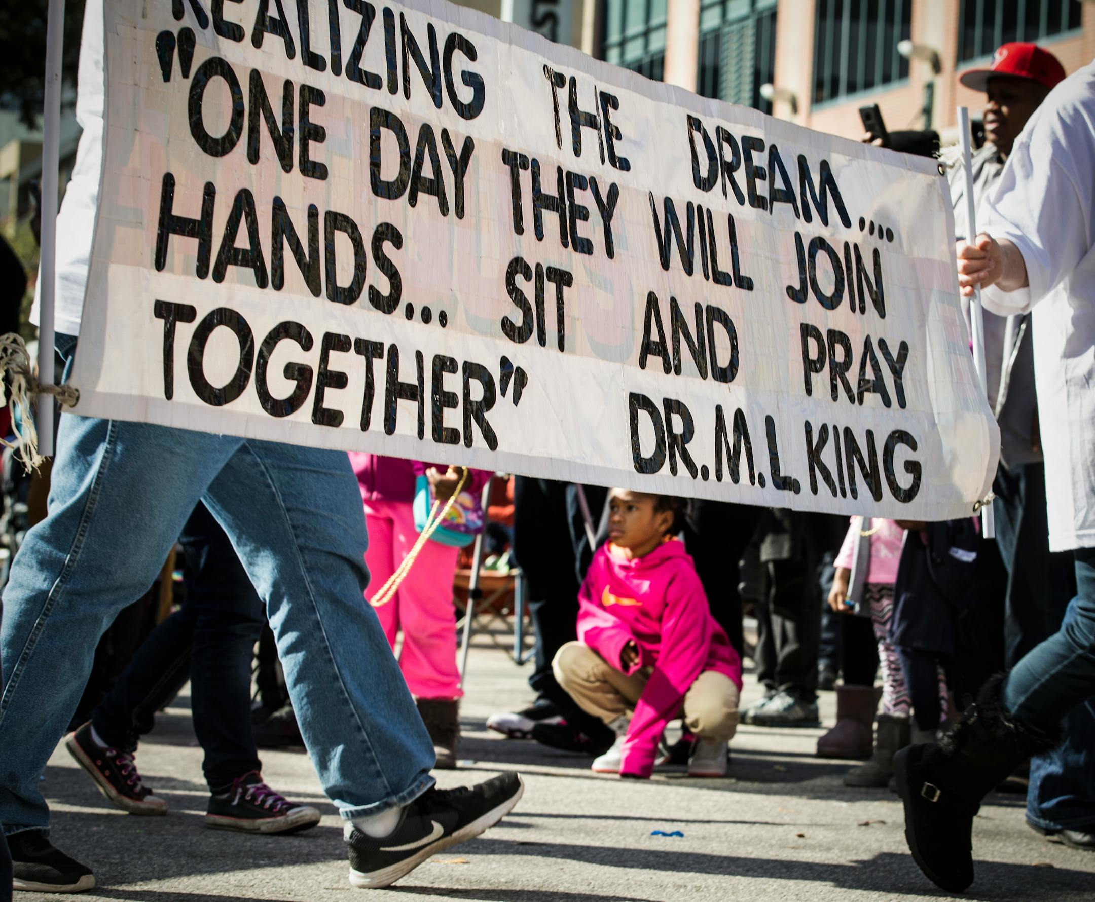 Marchers carried a banner at an event during a Martin Luther King Jr. Day parade in 2018.