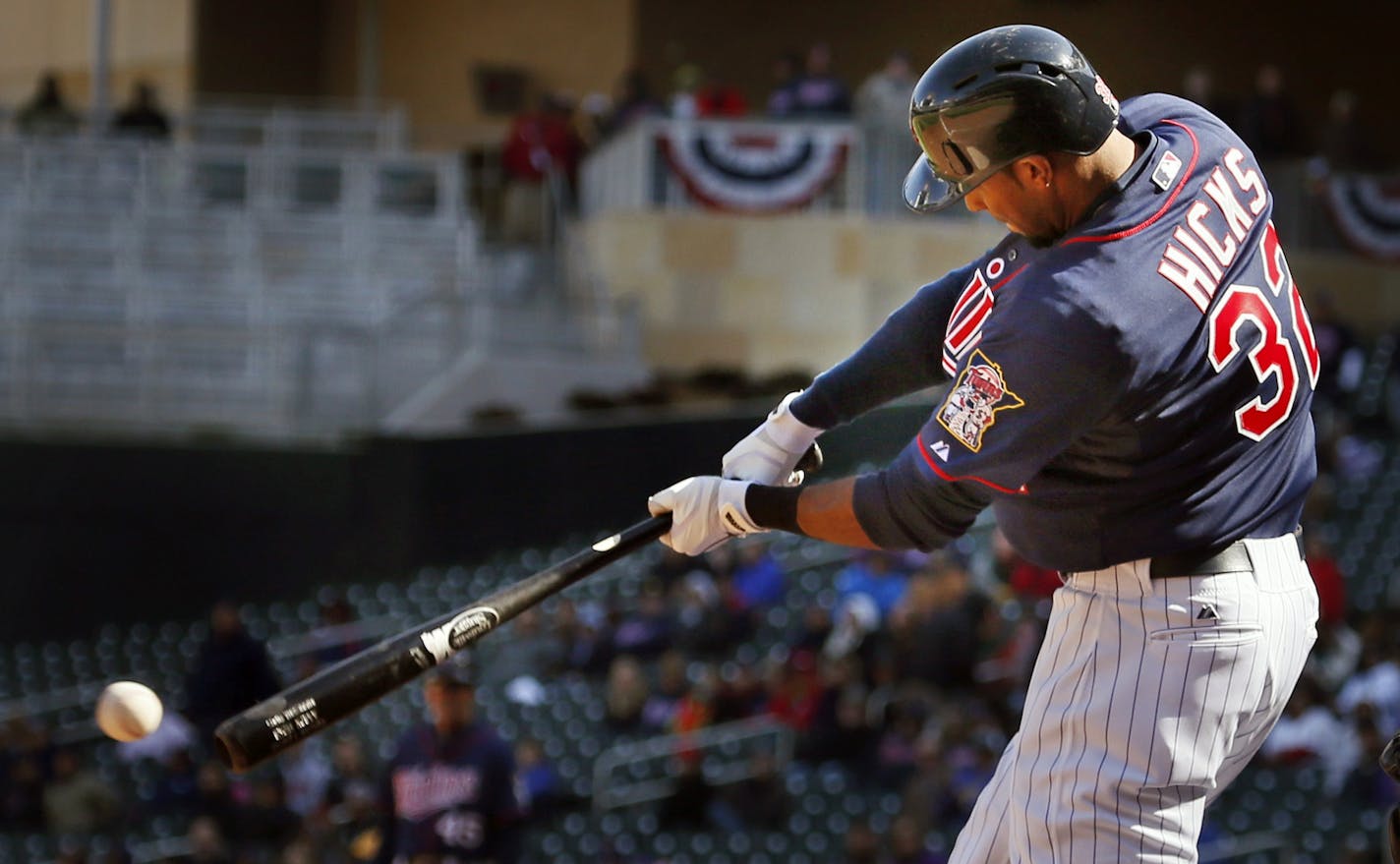 Aaron Hicks hits a two-run single to put the Twins up 8-2 in the eighth inning.