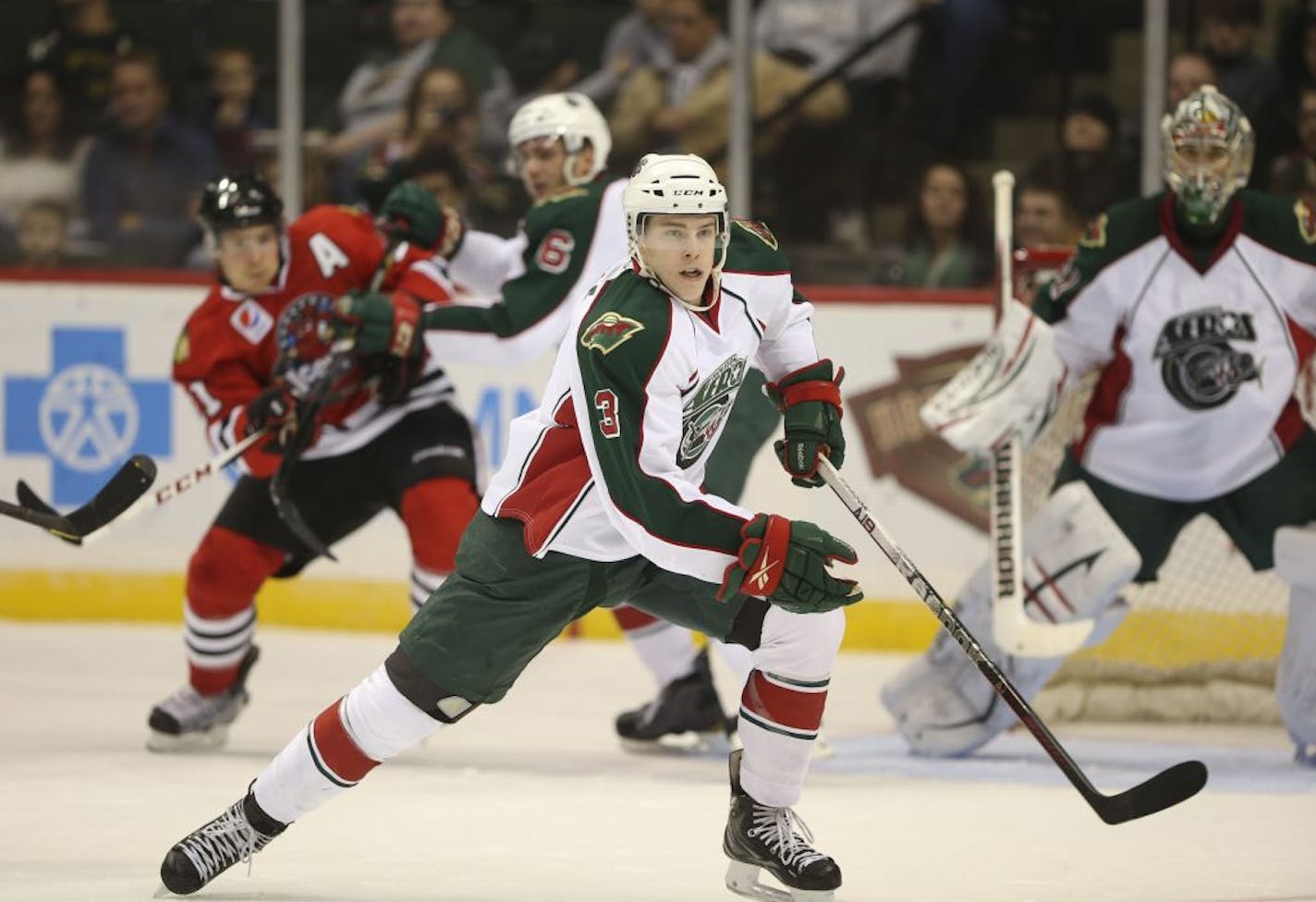 The Houston Aeros' Charlie Coyle worked in the defensive end Sunday night at Xcel Energy Center in an American Hockey League game against the Rockford Icehogs. Coyle, acquired from San Jose in the Brent Burns trade, has the type of all-around game that could have him in a Wild uniform soon after the NHL lockout ends.