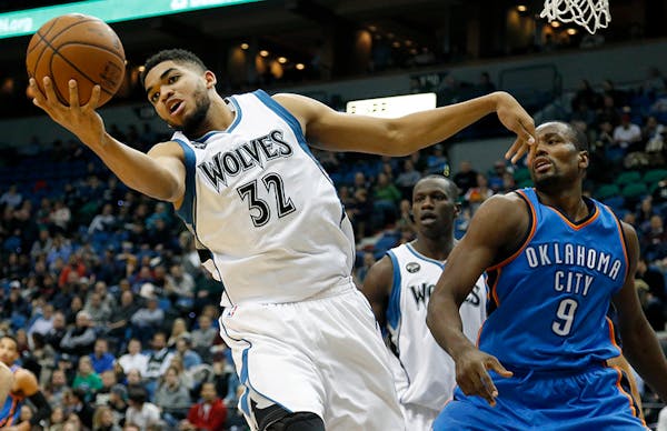 Karl-Anthony Towns (32) grabbed a rebound in the third quarter.