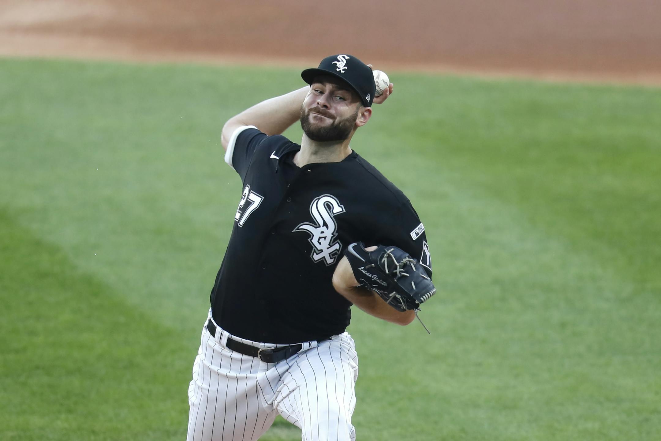 Chicago White Sox starting pitcher Lucas Giolito delivers during the first inning of a baseball game against the Minnesota Twins Friday, July 24, 2020, in Chicago.