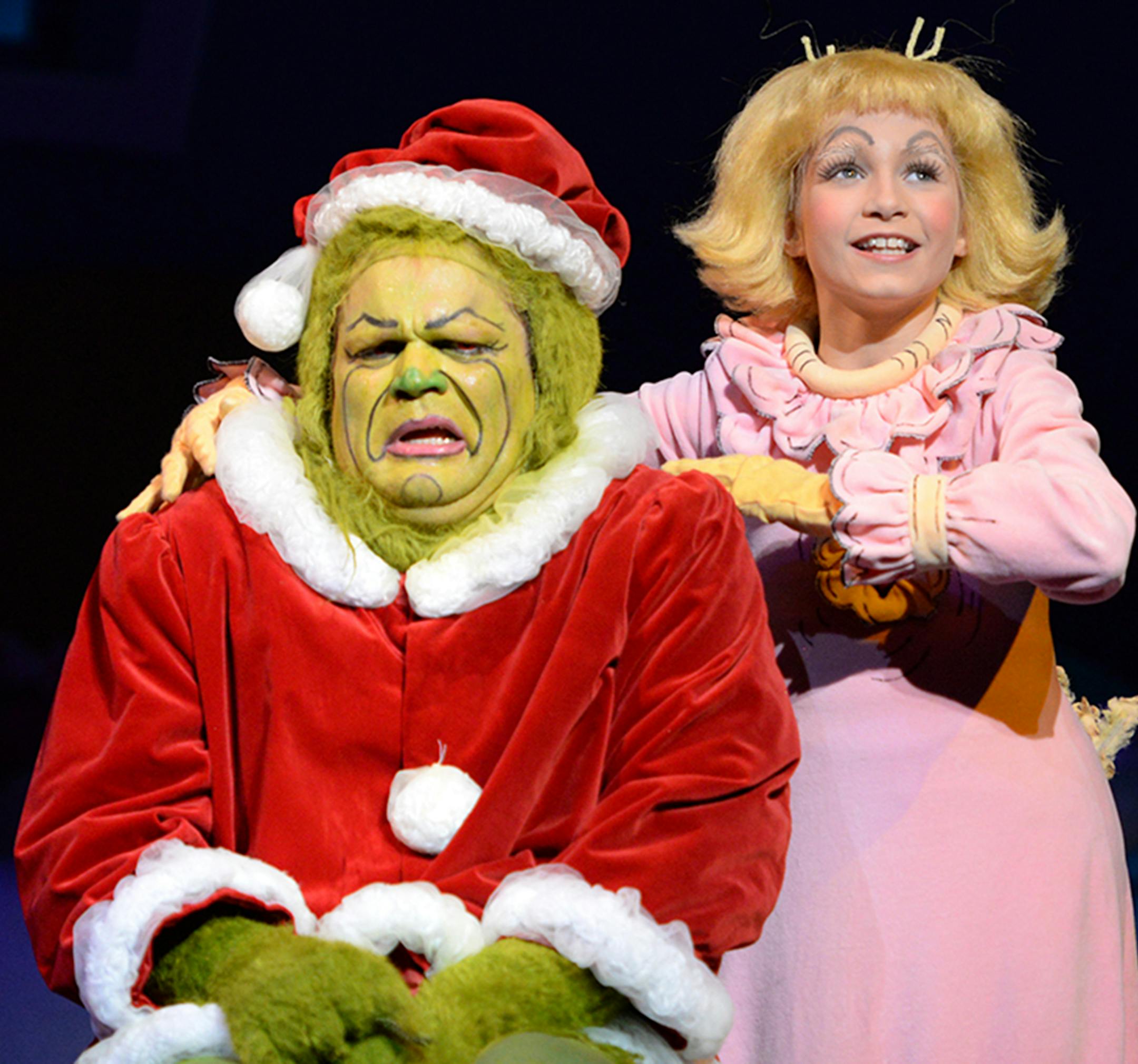 Reed Sigmund as the Grinch and Mabel Weismann as Cindy-Lou Who in "Dr. Seuss's How the Grinch Stole Christmas" by Children's Theatre Company.
photo by Kaitlin Randolph