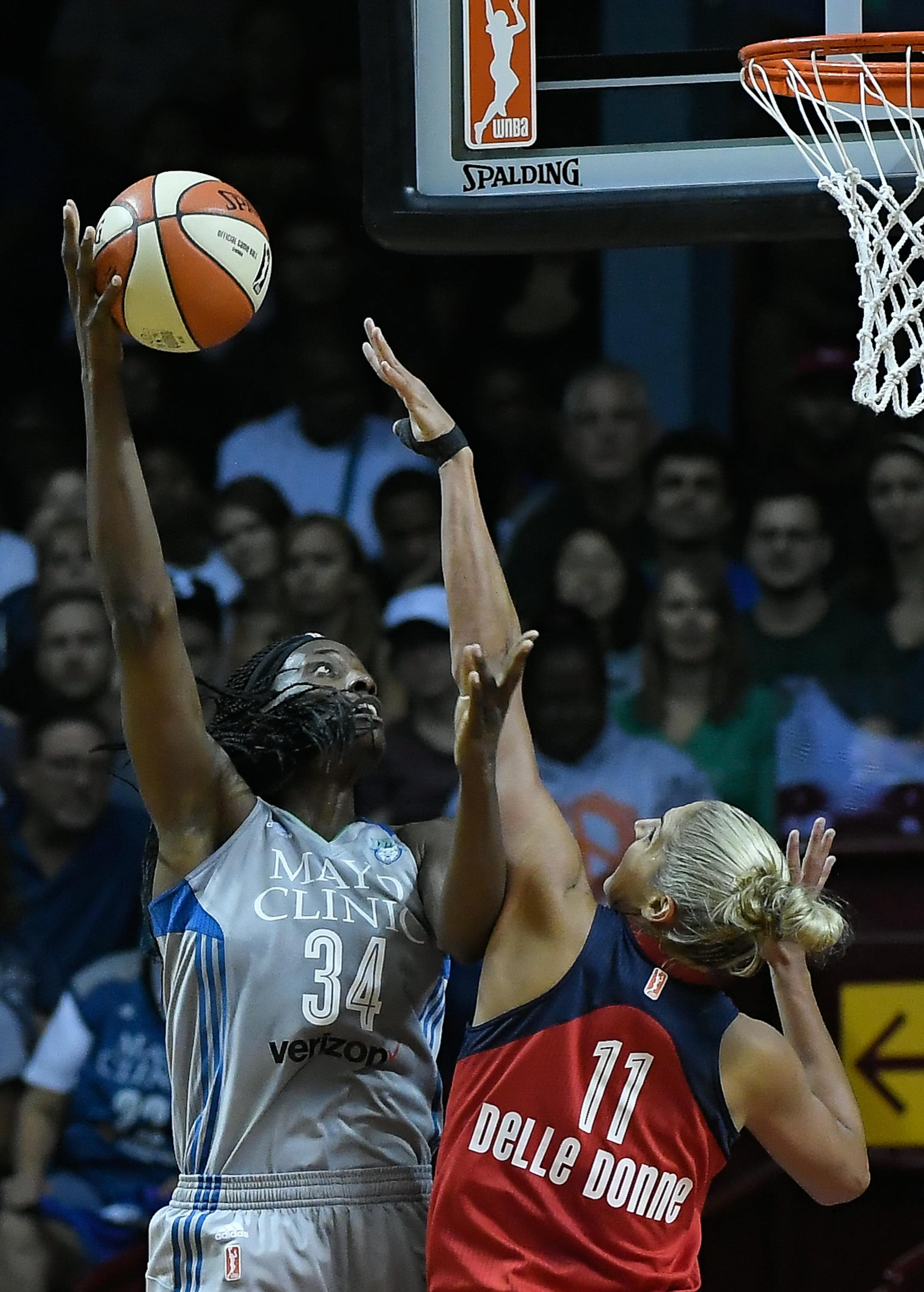 Minnesota Lynx center Sylvia Fowles (34) scored a layup despite the defense by Washington Mystics guard Elena Delle Donne (11) in the second quarter. ] AARON LAVINSKY ï aaron.lavinsky@startribune.com The Minnesota Lynx played the Washington Mystics in the second round of the WNBA semifinals on Thursday, Sept. 14, 2017 at Williams Arena in Minneapolis, Minn.
