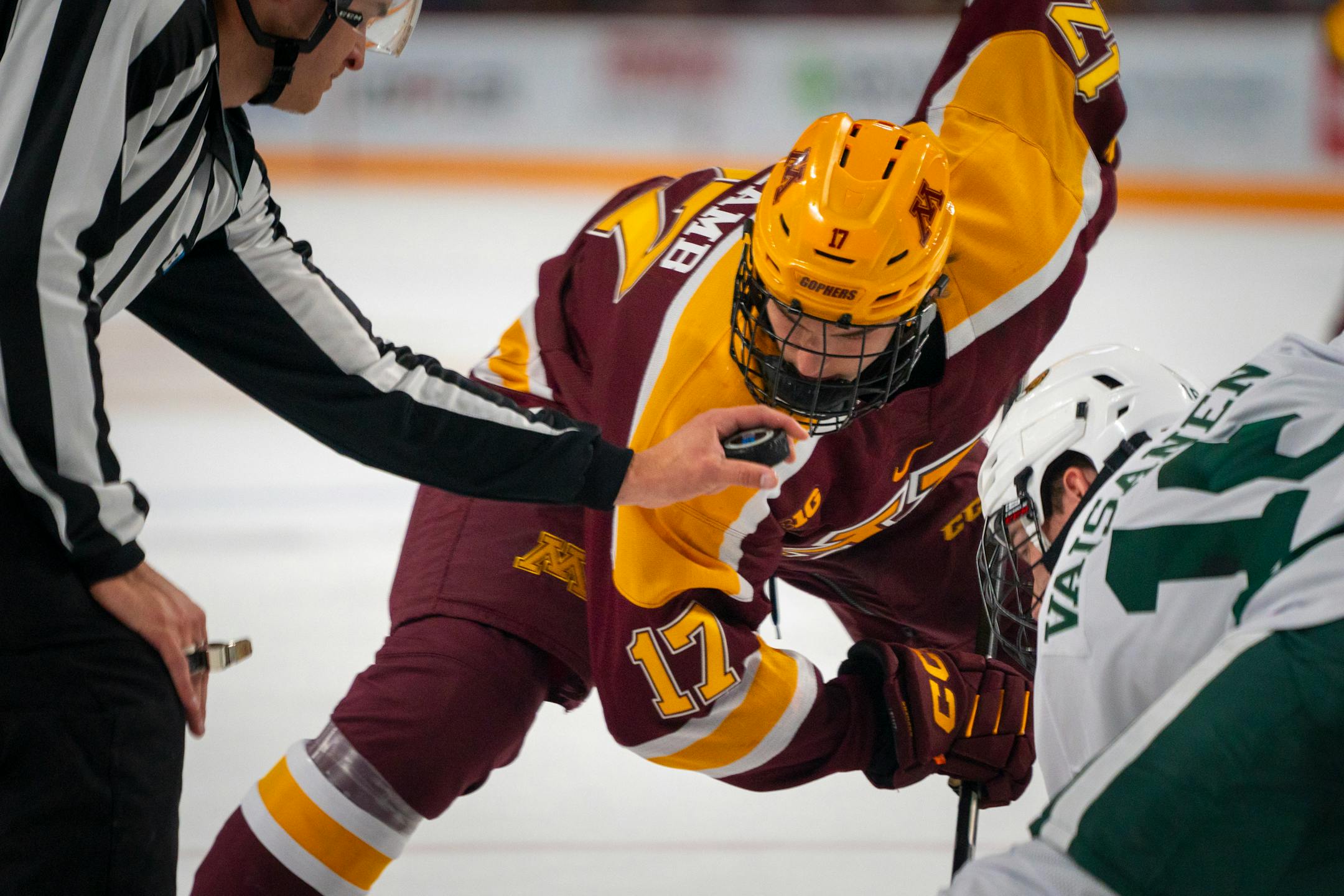 Minnesota's Brody Lamb (17, Forward) eyes the puck before a faceoff in the second period against Bemidji State University.