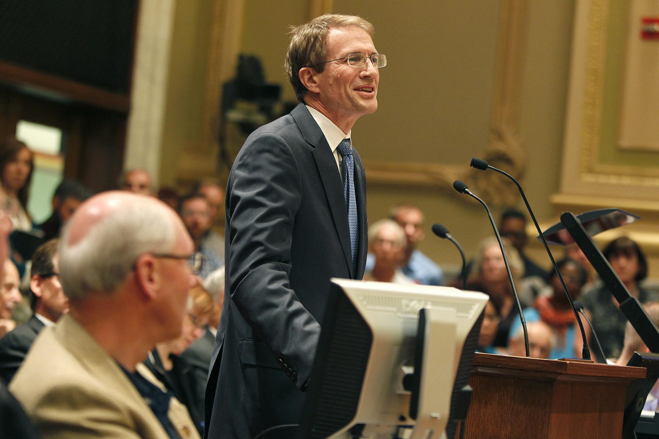 Northern States Power President David M. Sparby made a brief statement in a crowded, controversial hearing in Minneapolis City Council chambers on whether the city should form its own utility, Thursday, August 1, 2013 in Minneapolis, MN.