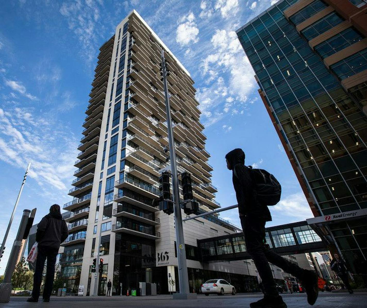 Nearly 50,000 people now call downtown Minneapolis home, thanks in part to new apartment buildings like 365 Nicollet, pictured above.