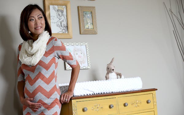 Alissa Loren modeled one of her favorite go-to maternity looks: a casual T-shirt dress accessorized with a scarf.