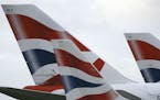 FILE - In this file photo dated Tuesday, Jan. 10, 2017, British Airways planes are parked at Heathrow Airport in London. ???????? The parent company o