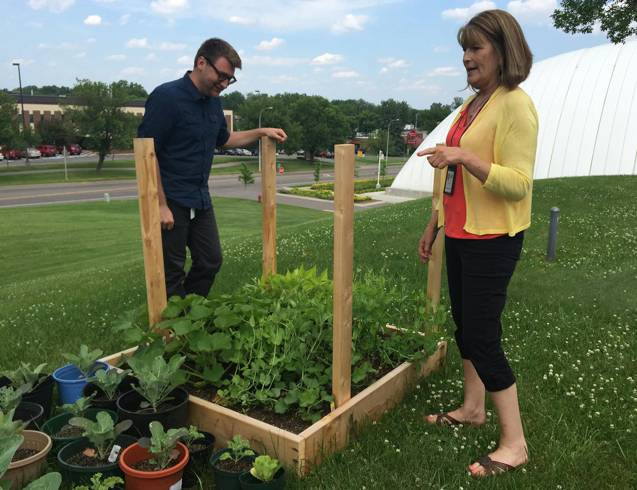 West St. Paul Assistant City Manager Sherrie Le and Dan Nowicki, marketing and social media specialist who is leading the garden effort. Photo by Jessie Van Berkel