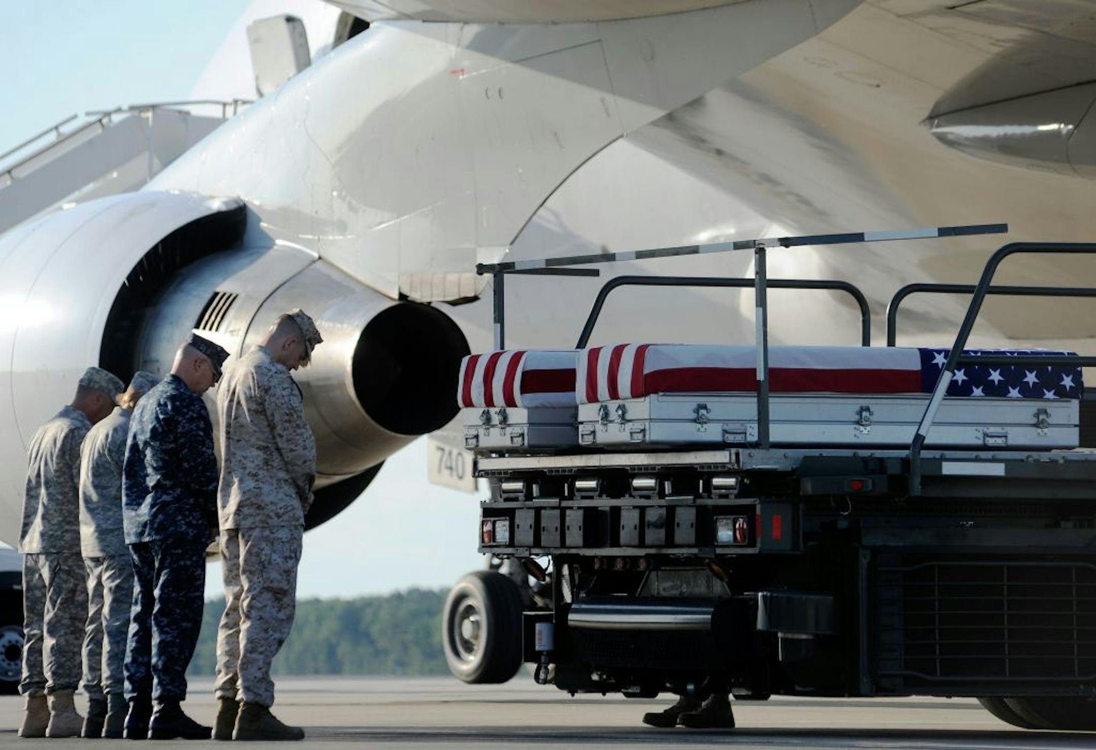 The remains of servicemen, including Marine Lance Cpl. Robert Greniger of Greenfield, Minn., arrived Thursday at Dover Air Force Base in Delaware. Greniger, 21, was killed in combat Tuesday in Afghanistan's Helmand Province.