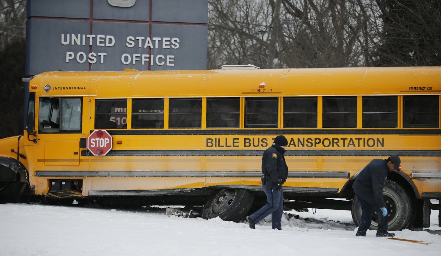 At the corner of Minnehaha Ave E. and Birmingham in St. Paul, a school bus crashed into the frontage of the post office. A couple children were taken to the hospital with minor injuries.] Richard Tsong-Taatarii/rtsong-taatarii@startribune.com