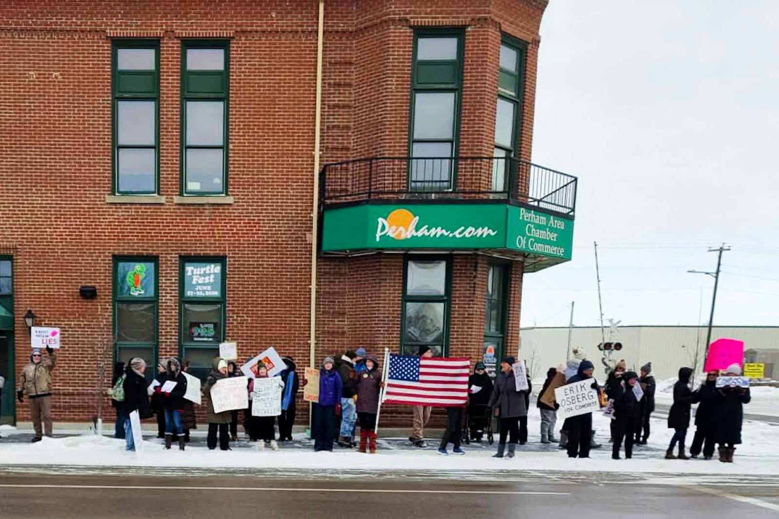 People attend an anti-ICE protest on Jan. 11 in Perham, Minnesota.