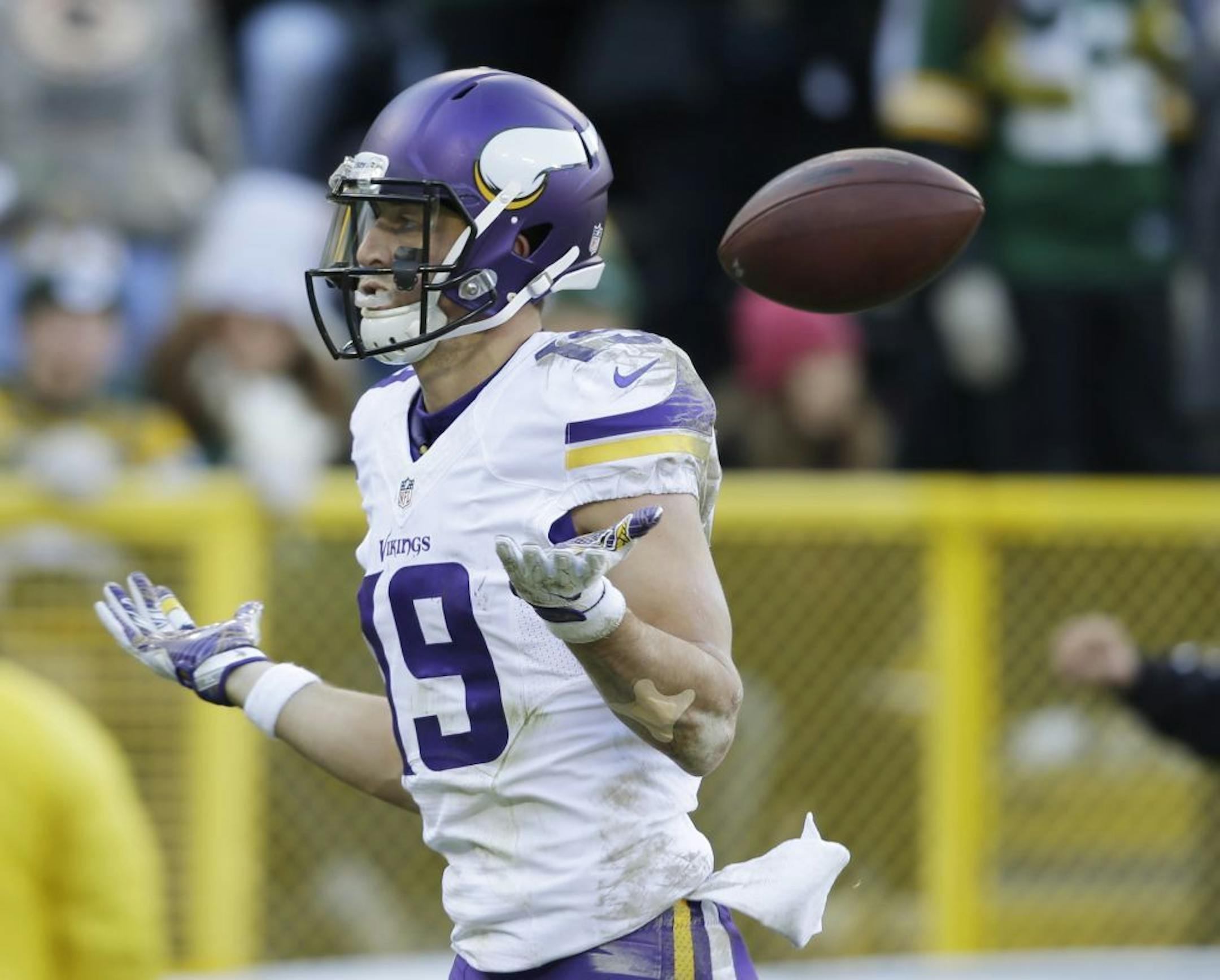 Minnesota Vikings' Adam Thielen celebrates his touchdown catch during the first half of an NFL football game against the Green Bay Packers Saturday, Dec. 24, 2016, in Green Bay, Wis.