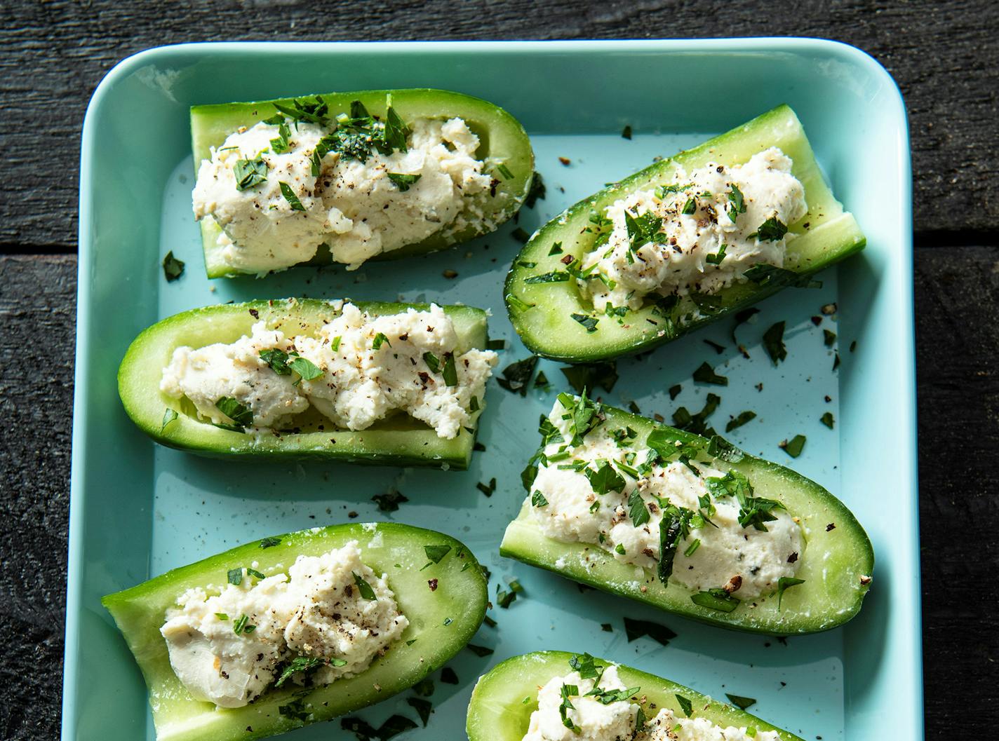 Cucumbers stuffed with herbed cheese, a refreshing summer snack or side to burgers. Recipe from Beth Dooley, Photo credit: Mette Nielsen, Special to the Star Tribune