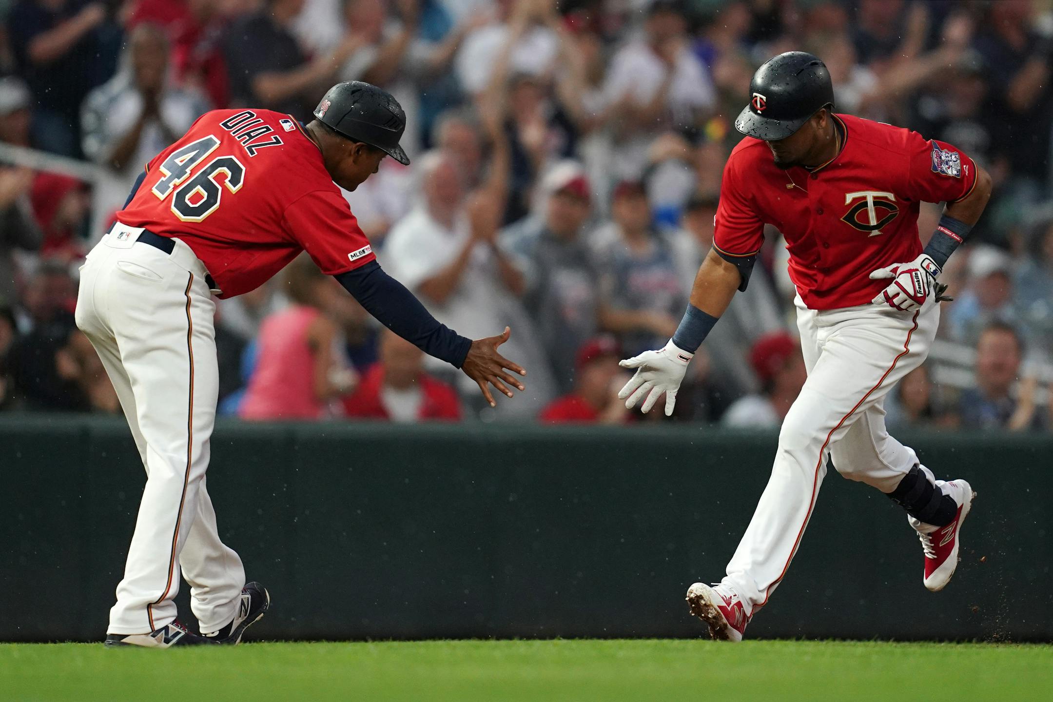 Twins third baseman Luis Arraez celebrated with third base coach Tony Diaz after hitting a home run in July.