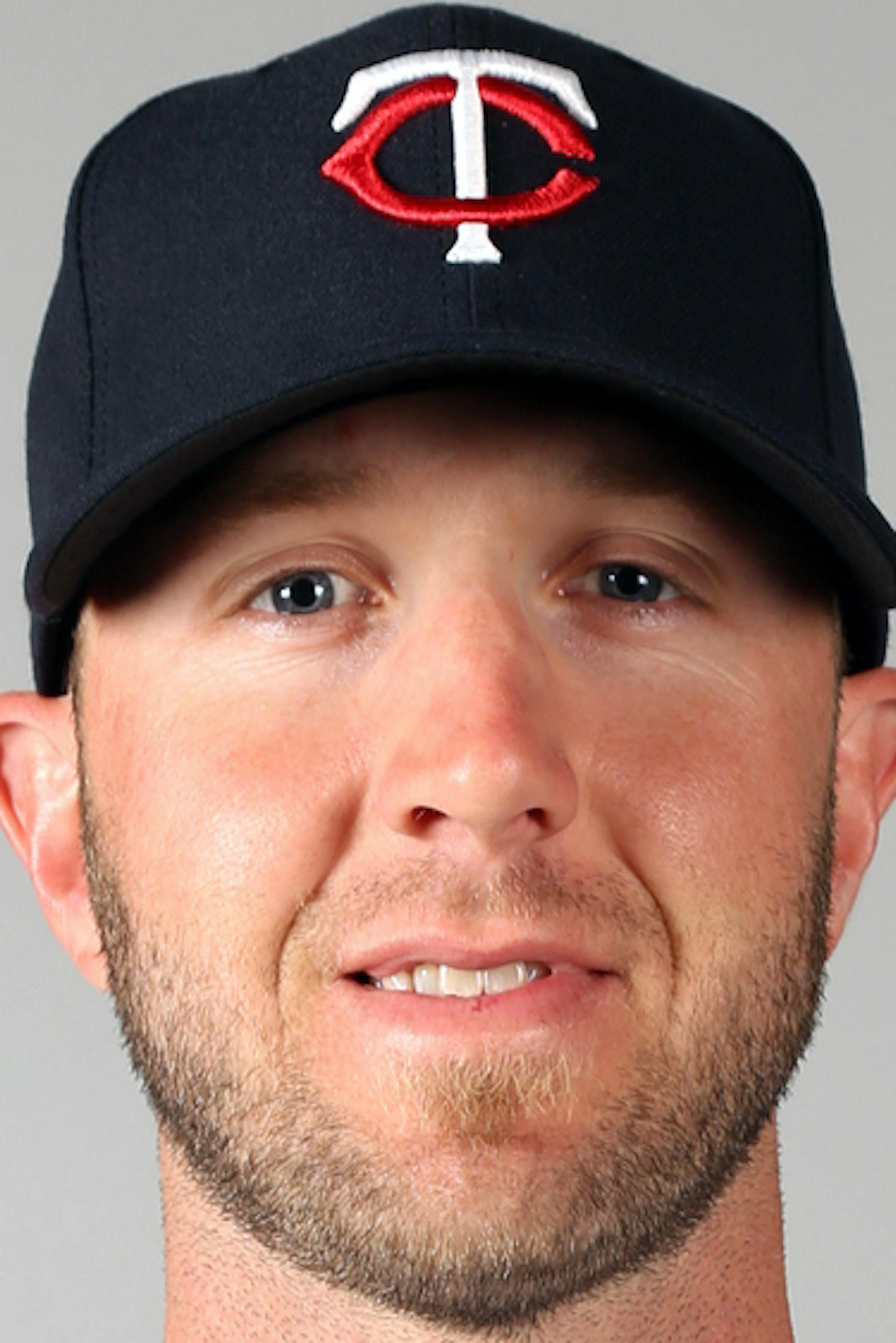 FORT MYERS, FL - FEBRUARY 19: Jared Burton (61) of the Minnesota Twins poses during Photo Day on Tuesday, February 19, 2013 at Hammond Stadium in Fort Myers, Florida. (Photo by Robbie Rogers/MLB Photos via Getty Images) *** Local Caption *** Jared Burton ORG XMIT: 159448017