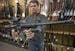 Jim Rauscher, president of Joe's Sporting Goods in Little Canada, held up a Colt AR-15 style rifle. He said people have been calling to ask: "What do 