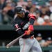 The Twins' Byron Buxton hits an RBI triple, his first triple in more than a year, against the Orioles during the fourth inning Tuesday in Baltimore.