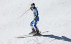 Paula Moltzan celebrates during the alpine ski, mixed team parallel event, at the World Championships, in Meribel, France