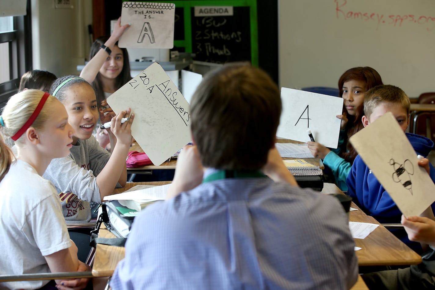 Ramsey Middle School English teacher Sean Bailey led his students through MCA practice material in March.