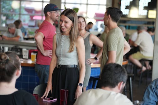 Molly Coleman mingles with her supporters on election night on Aug. 12 in St. Paul. She won the city's Ward 4 special election, which was called after former Council Member Mitra Jalali stepped down.