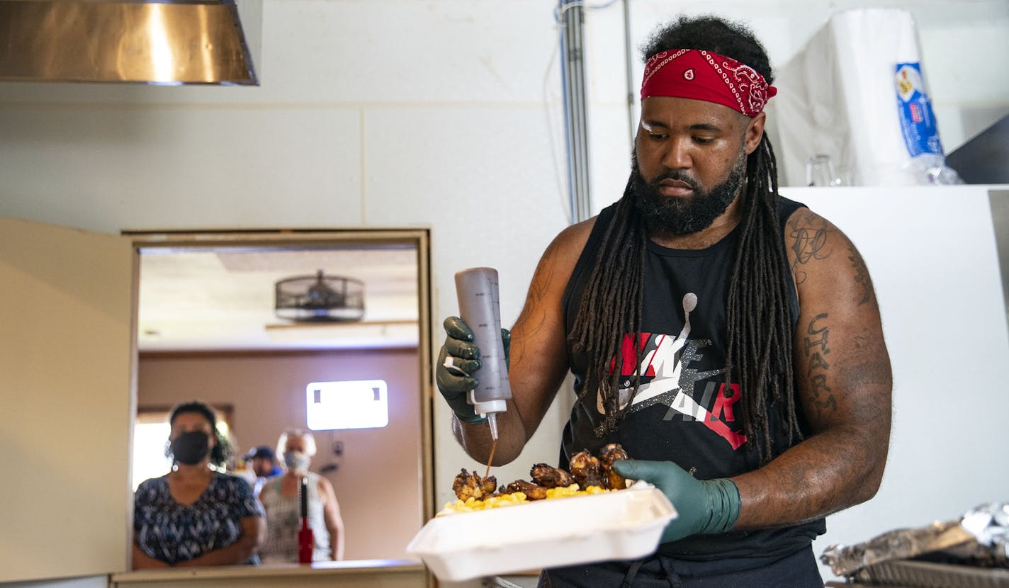 A customer waited for her order of Caribbean jerk chicken and mac and cheese while Antonio O'Neil covered it in sauce. ] ALEX KORMANN • alex.kormann@startribune.com Antonio O'Neil's Jamrock Cultural Restaurant is a new black-owned food joint in Superior, WI cooking up Caribbean inspired food. In order to be served, customers have to enter Average Joe's Pub and proceed to a literal hole in the wall where O'Neil's cash only business is set up.