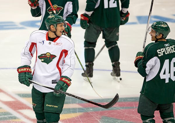 1st Day of School - The Minnesota Wild held their first day of training camp Friday at the Xcel Center in St. Paul. Here, forward Zach Parise (left) a