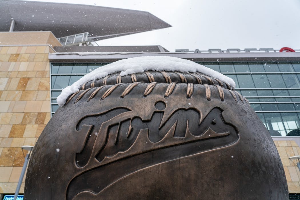 Snow fell at Target Field on Friday, April 12, 2019. Several inches of wet snow have postponed Twins games at Target Field.