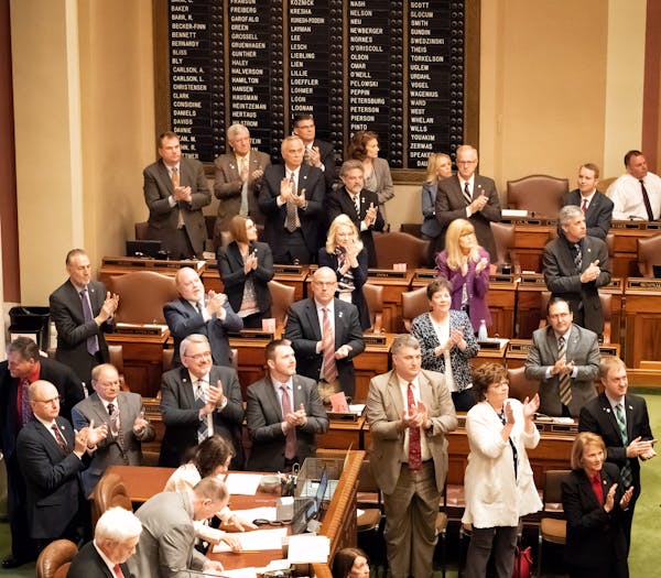 The joint legislature stood, applauded and looked toward the House Gallery for the new Regent Randy Simonson but they didn't know he was not in The Ca