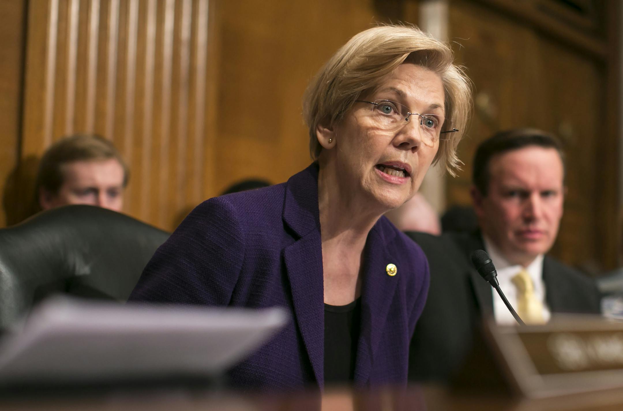 FILE ó Sen. Elizabeth Warren (D-Mass.) questions Betsy DeVos, Donald Trump's pick for education secretary, at her confirmation hearing before the Senate Health, Education, Labor and Pensions Committee, on Capitol Hill in Washington, Jan. 17, 2017. DeVos, a wealthy Republican fund-raiser and philanthropist who is a major supporter of school vouchers, has faced vociferous opposition over her nomination. (Al Drago/The New York Times)