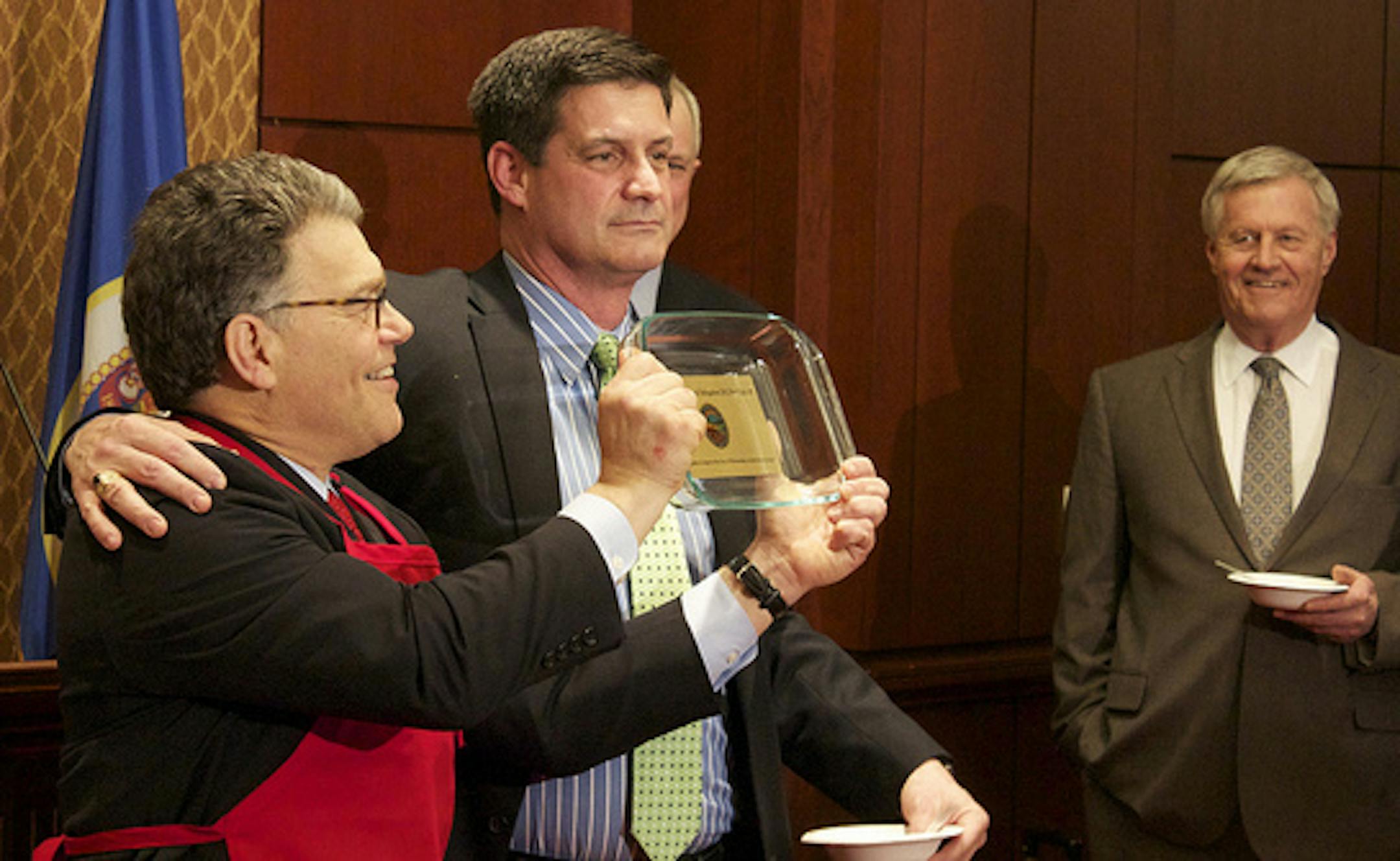 Sen. Al Franken, left, and Rep. Chip Cravaack tied for first in the second annual "Hotdish Off" for the state's members of Congress.