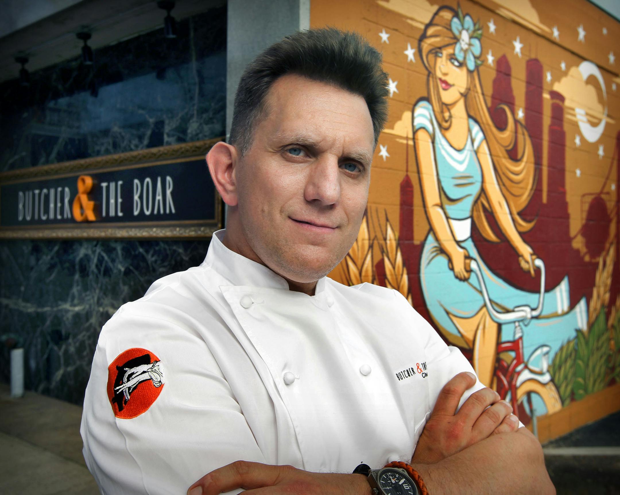 Butcher & the Boar Chef, Jack Riebel. Restaurant review; Butcher & the Boar with Chef, Jack Riebel. Food: "For the table" charcuterie platter, preserved shrimp, smoked beef long rib, one of the sausage plates (their pick), footlong hot dog, mint-chocolate frozen cake. A bourbon cocktails. The wood-burning stove. [ TOM WALLACE • twallace@startribune.com _ Assignments #20023344B_ May 10, 2012_ SLUG: rn0517_ EXTRA INFORMATION: Names CQ'ed by rick and subjects.