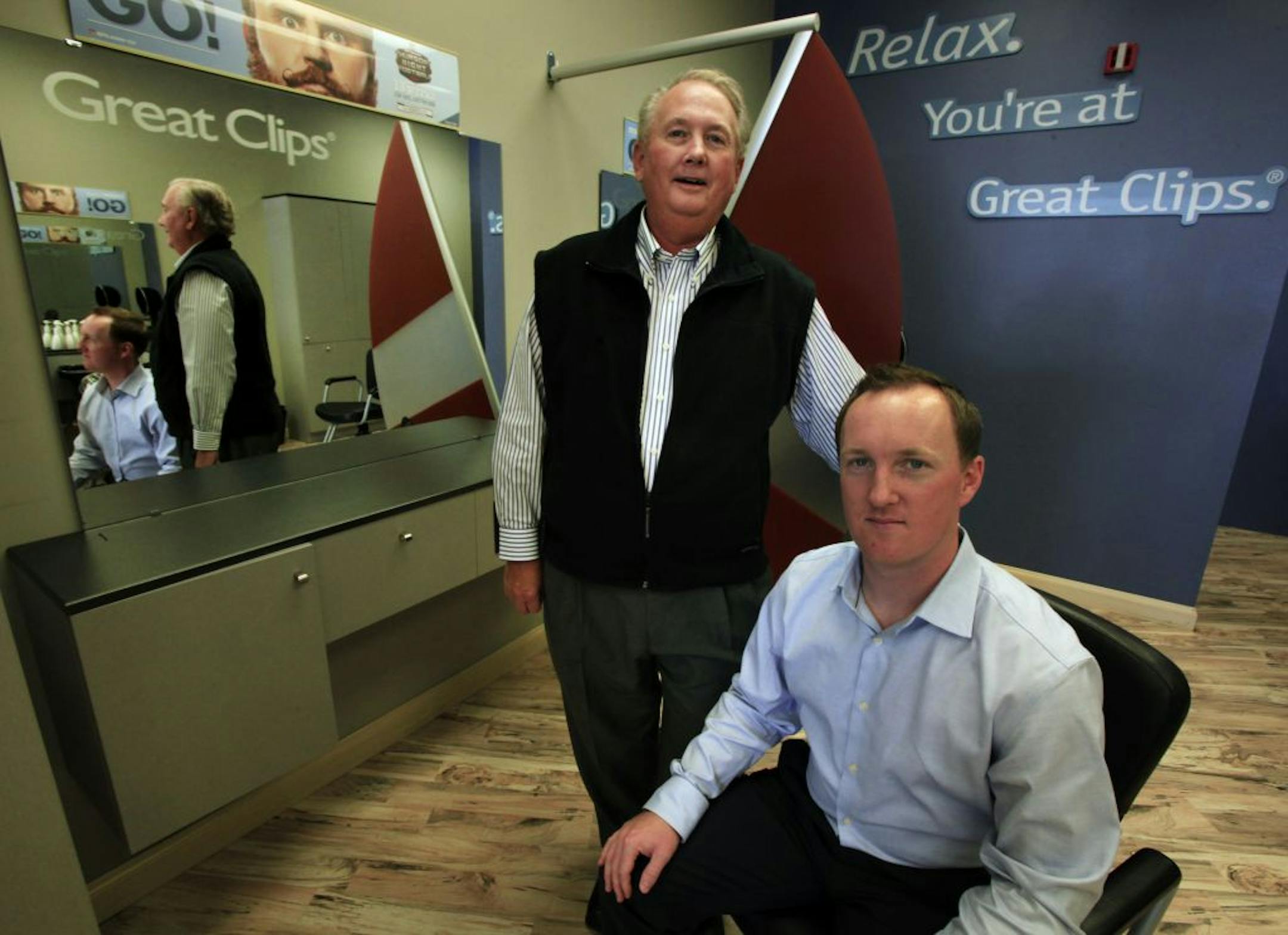 Pat Stevens (left) and Brian Stevens (right) own 13 Great Clips salons in Twin Cities. Pat has sold half the business to Brian as part of their succession plan. Pat and Brian at their Plymouth, MN Great Clips location on October 10, 2012.