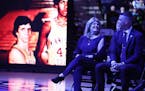 Flip Saunders' wife, Debbie, and his son Ryan laughed during a pregame ceremony honoring Flip Saunders on Thursday at Target Center. It included an un