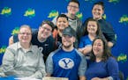 Rosemount's Jacob Smith was all smiles as he posed for pictures surrounded by his family after he signed to play football for Brigham Young University