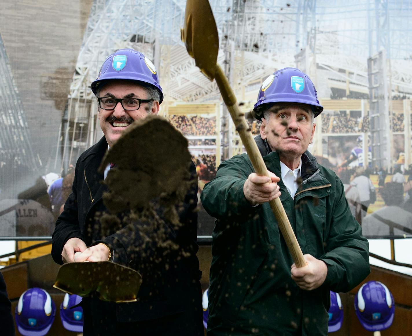 Vikings owners Mark and Zygi Wilf threw dirt next to Governor Mark Dayton and Minnesota Sports Facilities Authority Chairwoman Michele Kelm-Helgen. The ceremonial groundbreaking for the new, billion-dollar Vikings stadium took place Tuesday, December 3, 2013 ] GLEN STUBBE * gstubbe@startribune.com