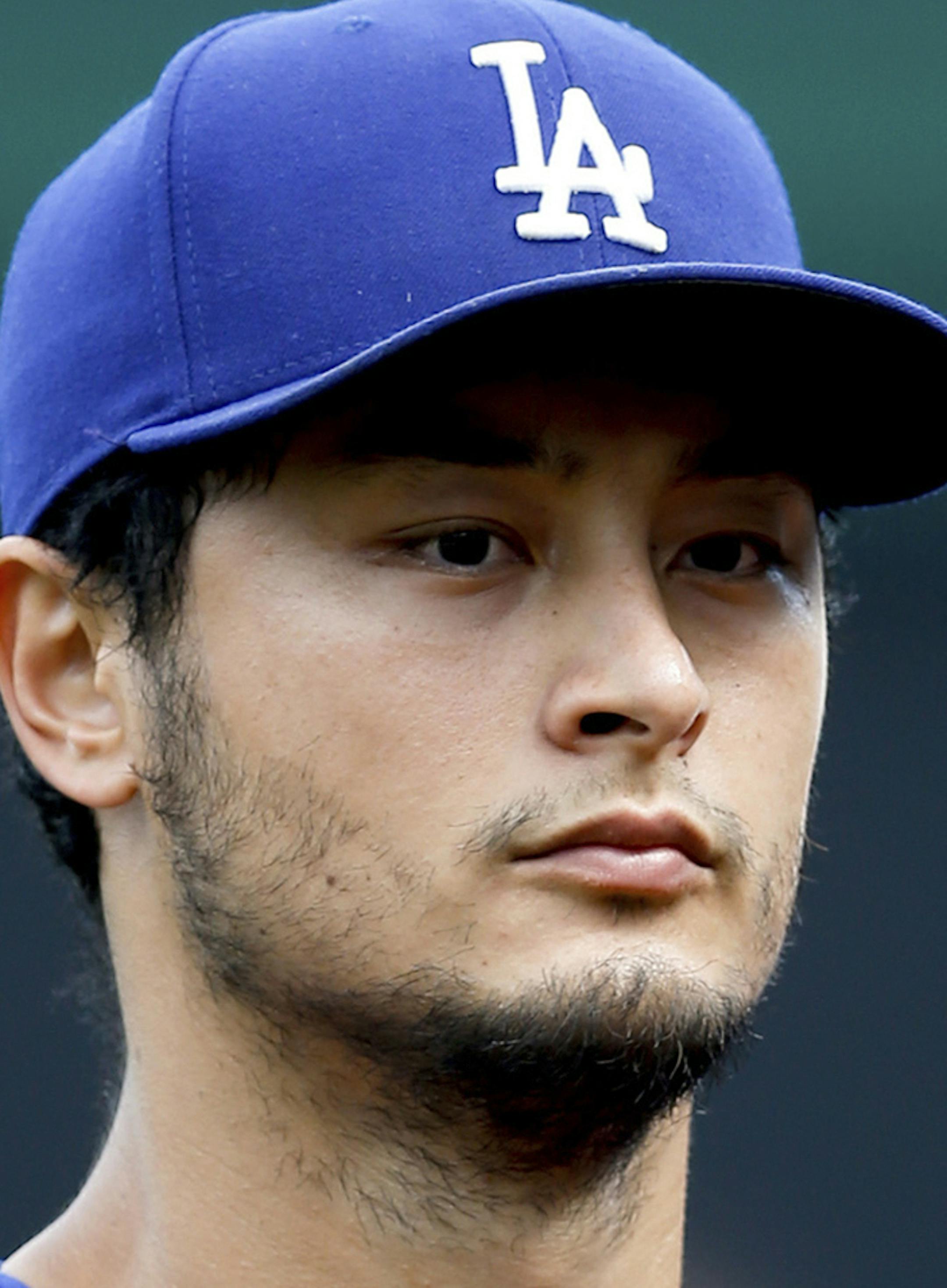 FILE - From left are 2017 file photos showing Jake Arrieta, Yu Darvish, Wade Davis, Eric Hosmer and Mike Moustakas. Arrieta, Darvish, Davis, Hosmer and Moustakas are among the players who became free agents. Free agents can start negotiating with new teams at 5:01 p.m. EST Monday, Nov. 6, 2017.†(AP Photo/File)